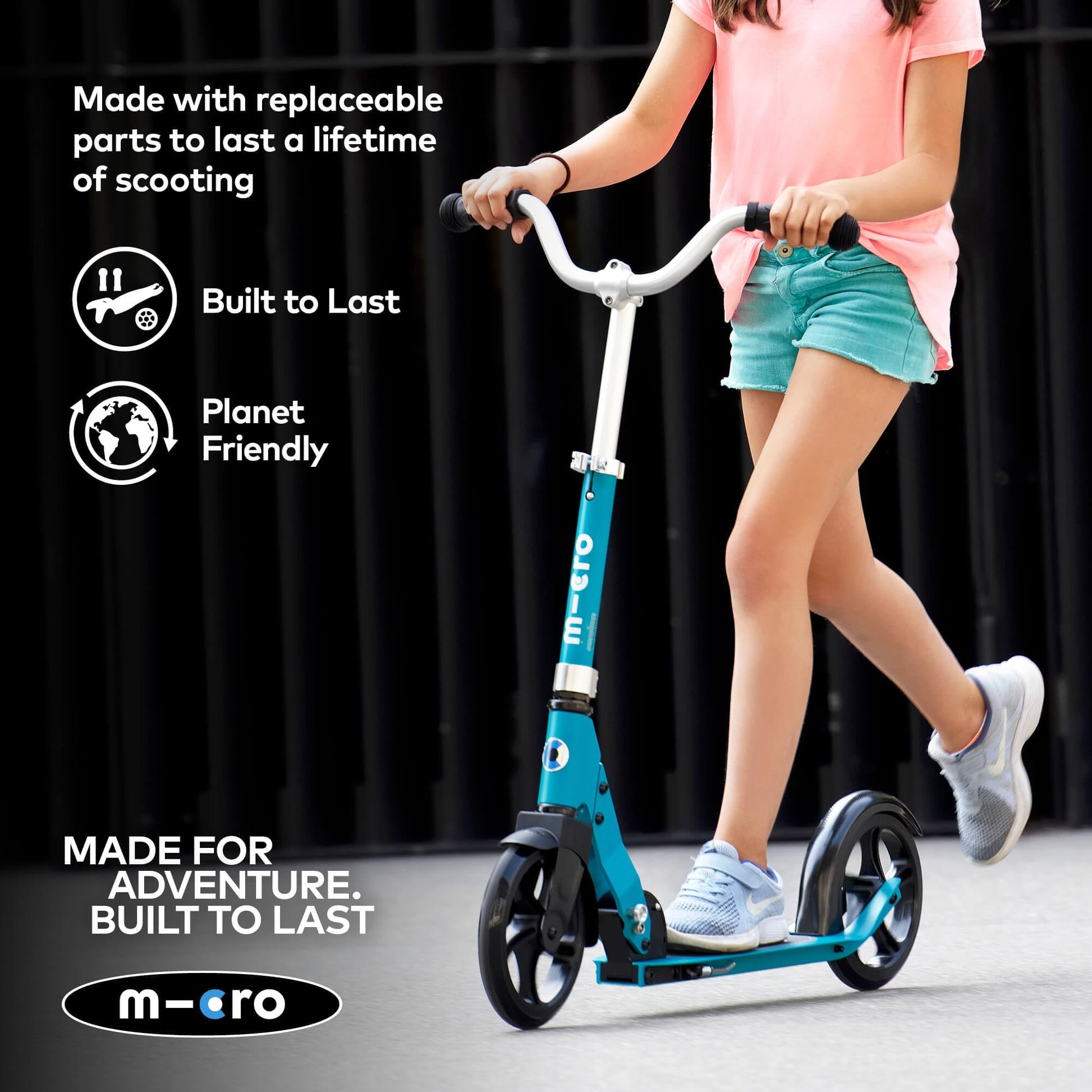 Aqua Micro Cruiser LED children's scooter with adjustable handlebar, light-up wheels, and foldable design for ages 5-12.