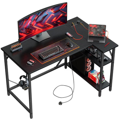 DOMSHOCT L Shaped Gaming Desk with Power Outlets, 100x70cm Small Corner Computer Table with Large Reversible Storage Shelves, Home Office PC Workstation with Hooks for Writing Study, Black
