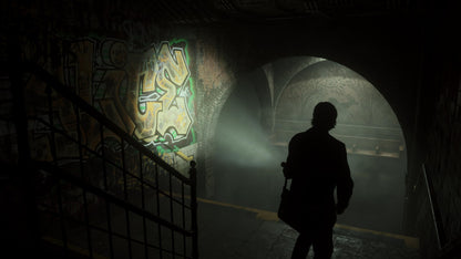 Alan Wake 2 Deluxe Edition PS5 game case with cover art, featuring dark, atmospheric imagery and Epic Games branding.