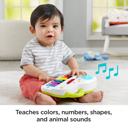 Fisher-Price Silly Sounds Light-Up Piano - UK English Edition, take-along toy piano with lights, real music notes and learning songs for baby and toddlers, GFK04