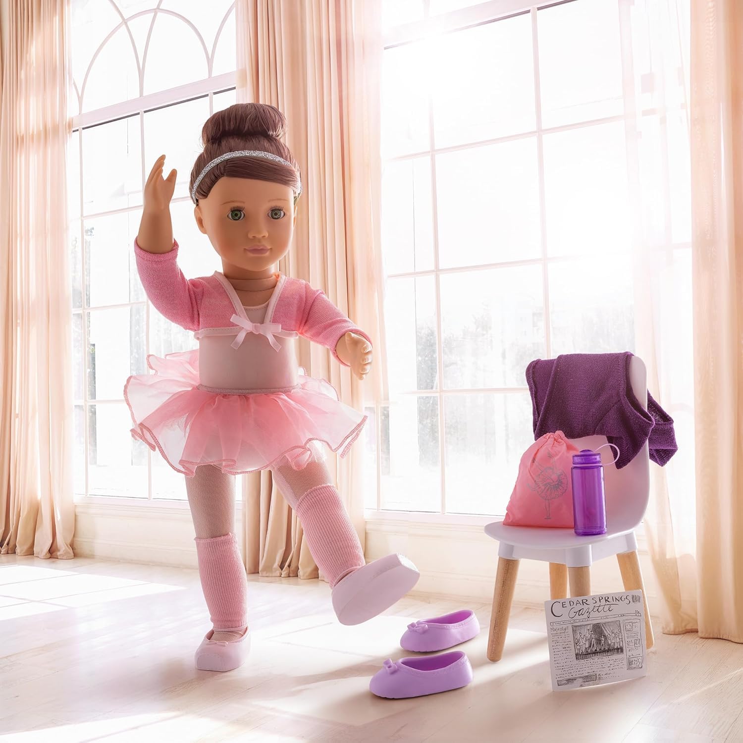 Poseable Our Generation Sydney Lee fashion doll in two outfits, showcasing a ballerina theme with accessories and storybook.