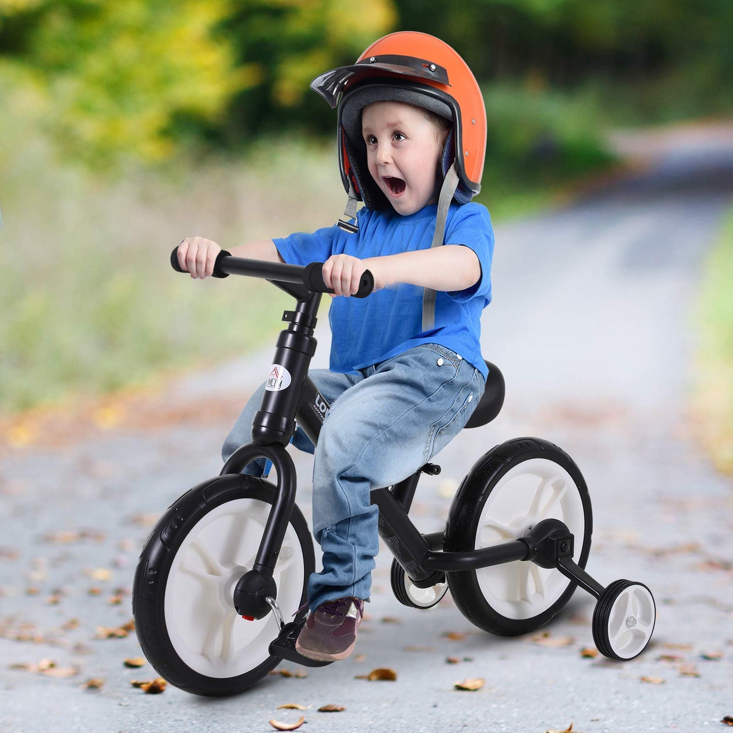 HOMCOM 11 inch kids balance bike in black with removable stabilizers and adjustable seat for children ages 2 to 5.