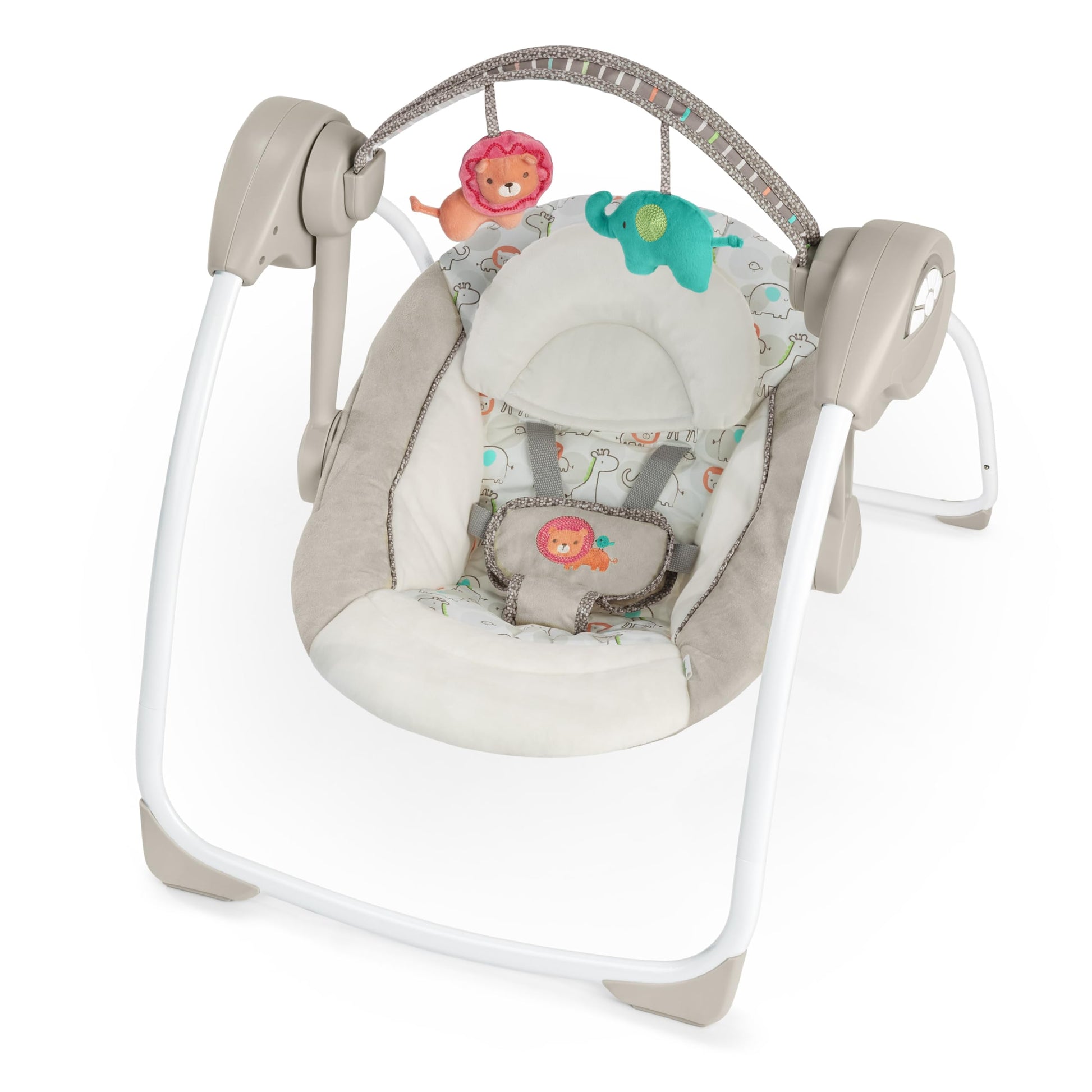 Ingenuity Soothe 'n Delight compact baby swing with toy bar and music, folded for travel, showing soft fabric and control panel