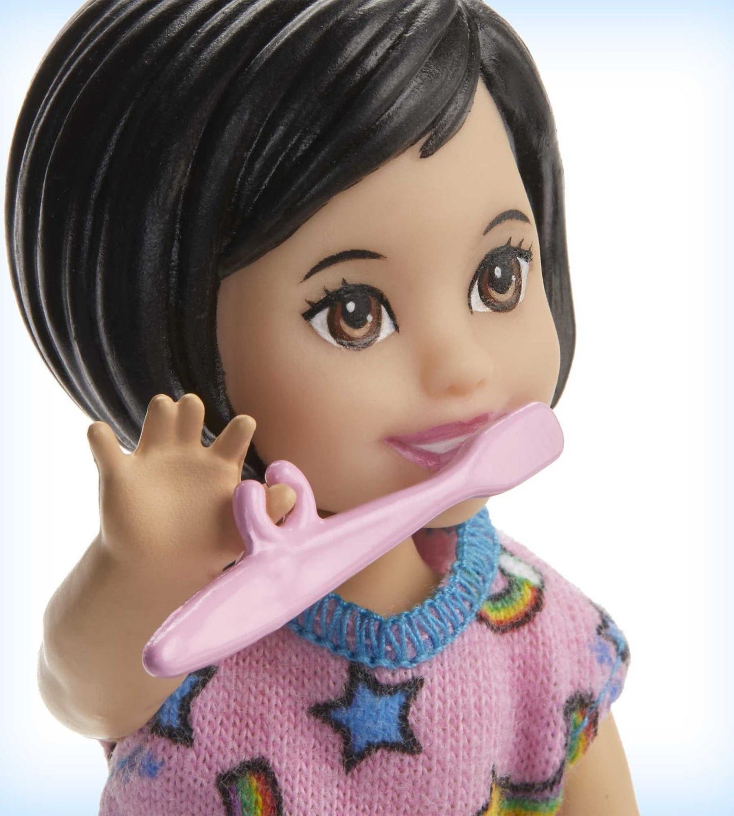 Barbie Skipper Babysitters Inc. bedtime playset with toddler doll, glow-in-the-dark pajamas, bed, kitty, teddy bear, and blanket.