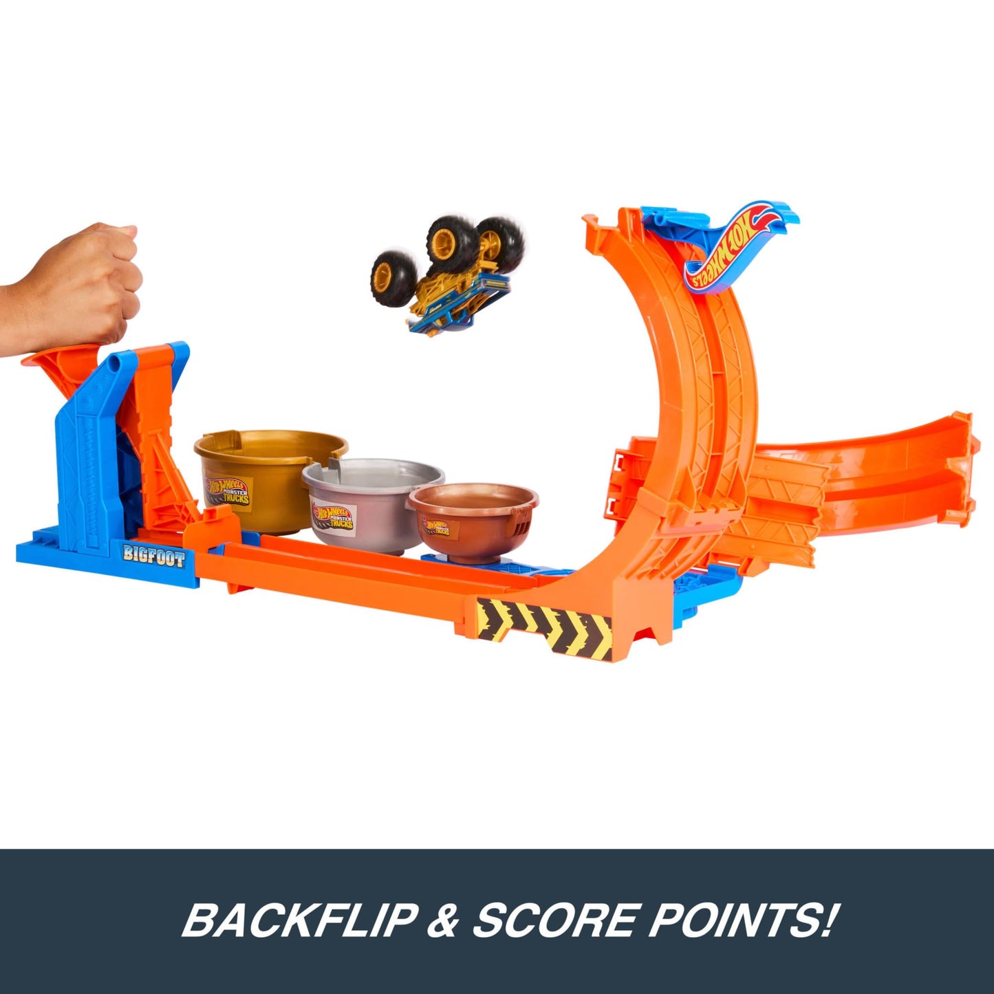 Hot Wheels Monster Trucks loop-and-flip playset with 1:64 scale Bigfoot die-cast truck and trophy challenge track.