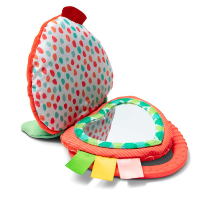 Melissa & Doug multi-sensory Peek-a-Boo Berry clip-on infant travel toy with colorful plush and hanging sensory elements for babies.
