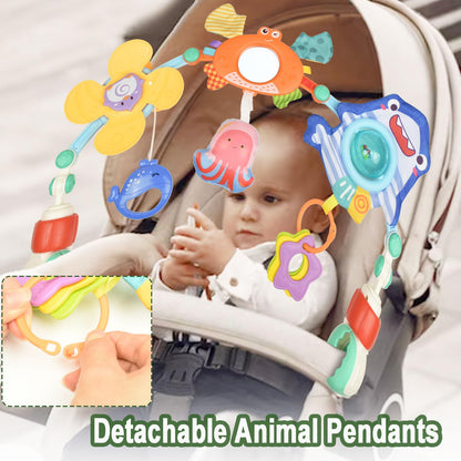 Coriver baby arch pram toy bar with colorful plush toys, clip-on design, suitable for cribs, strollers, and car seats for infants 0-6 months.