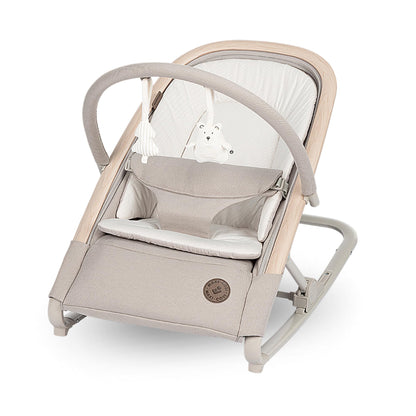 Maxi-Cosi Kori 2-in-1 ergonomic baby bouncer chair with toy arch, beige fabric, recline positions, and lightweight design for infants.