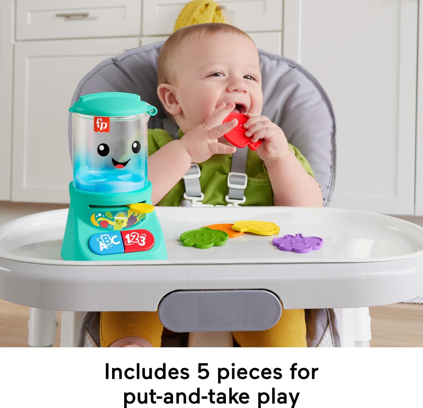 Fisher-Price Laugh & Learn baby toy smoothie maker with colorful buttons, music, and lights for toddlers aged 9 months and up.
