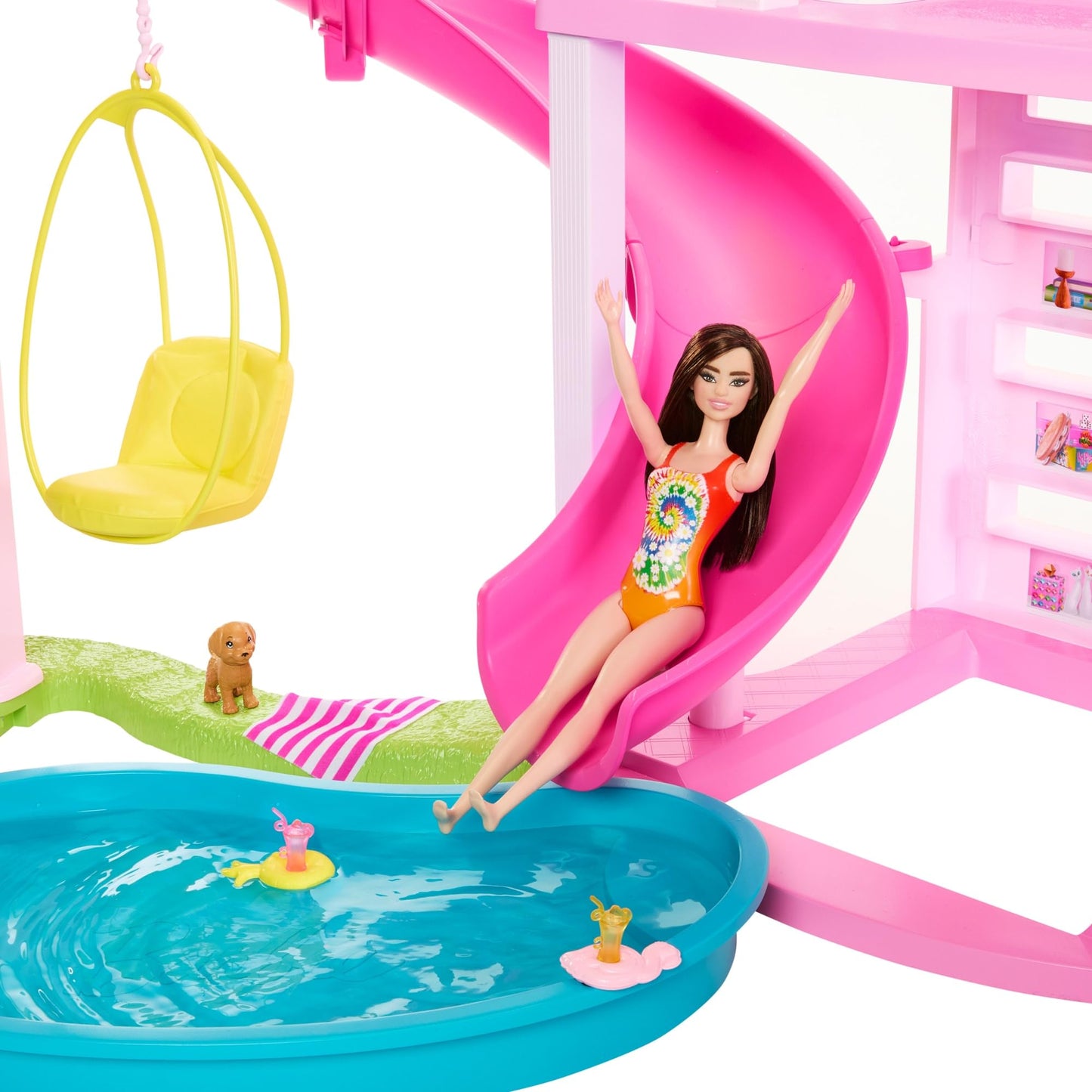 Barbie Dreamhouse, 3-storey toy house with pool, slide, elevator, and accessories for imaginative play.