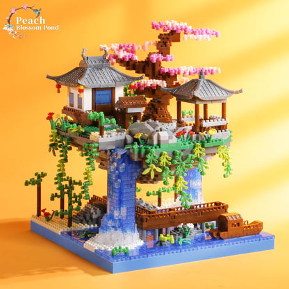 CAXIMSY Cherry Blossom Bonsai Treehouse building block set with 3300 pieces, featuring intricate tree and house details.