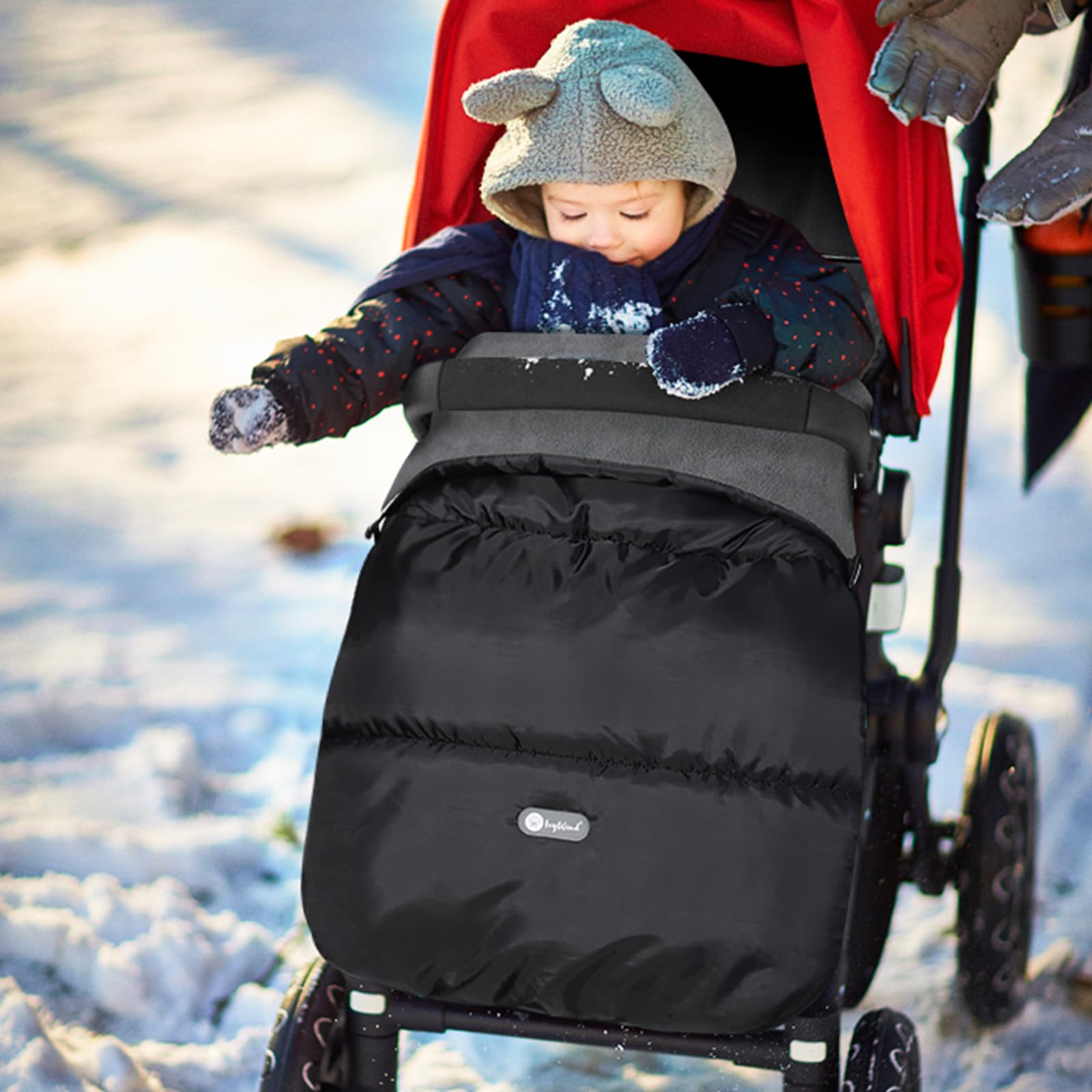 Black and grey IvyWind baby footmuff for pushchair, waterproof, warm pongee fabric with drawstring, zipper, washable, and easy access.
