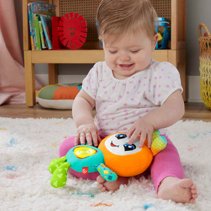 Fisher-Price DJ Groovin' Go baby learning toy with colorful lights, music, and sounds for children 6+ months, UK version.