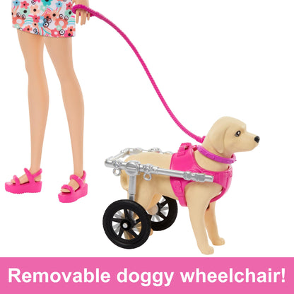 Barbie doll with two toy dogs, one in a wheelchair, and pet accessories in a colorful playset.