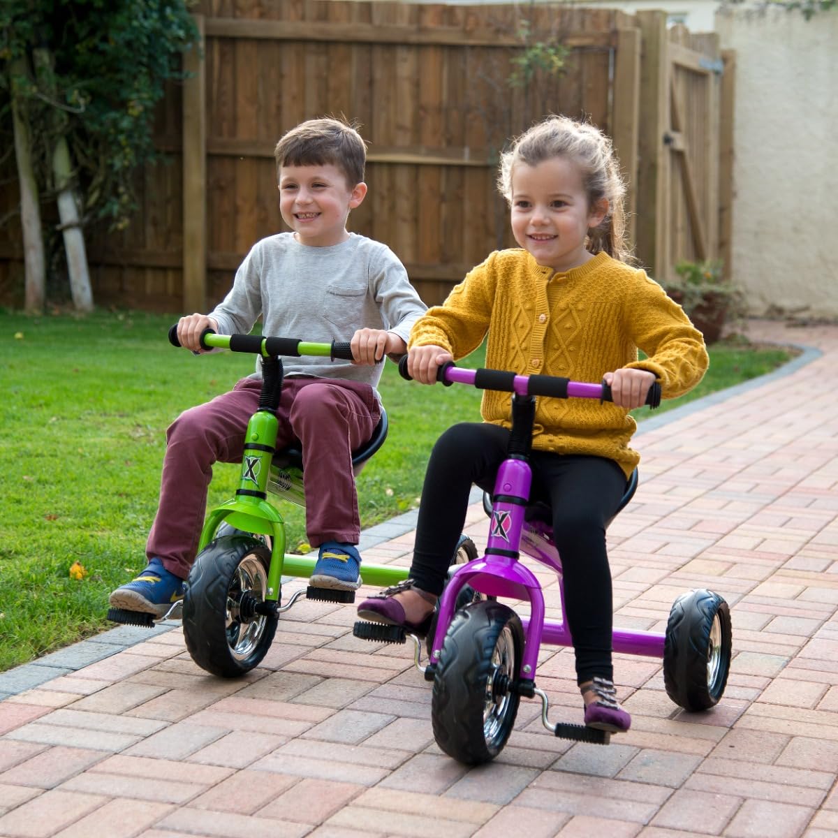 Xootz portable tricycle for kids featuring an easy clip design and vibrant colors suitable for outdoor play.