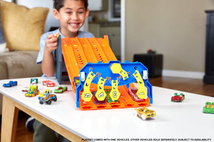 Hot Wheels Track Builder Action set featuring a 5-lane racetrack, toy storage bucket, and one toy car for ages 4 to 10.