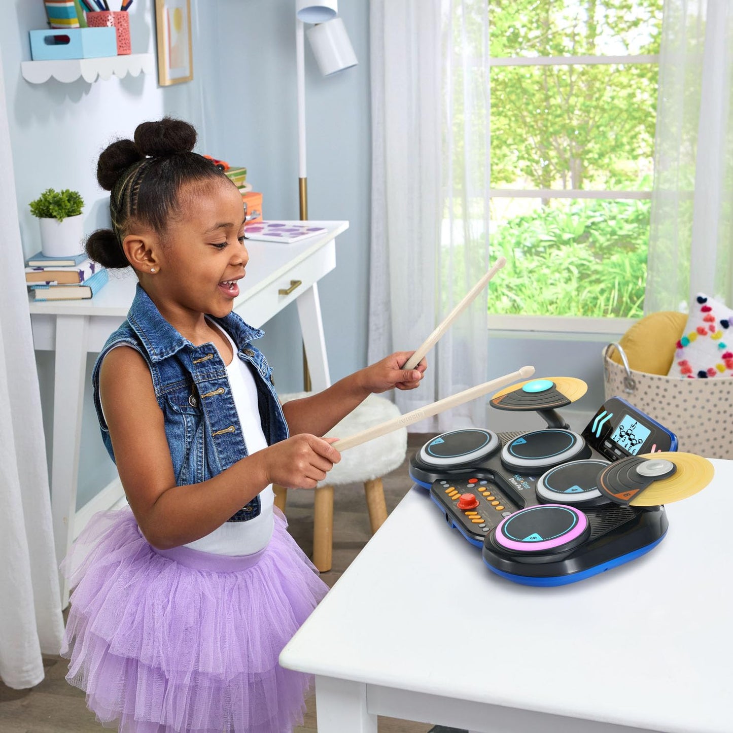 VTech Kidi Star Drum Pad in black, featuring colorful drum pads and control buttons for kids' music play and creativity.
