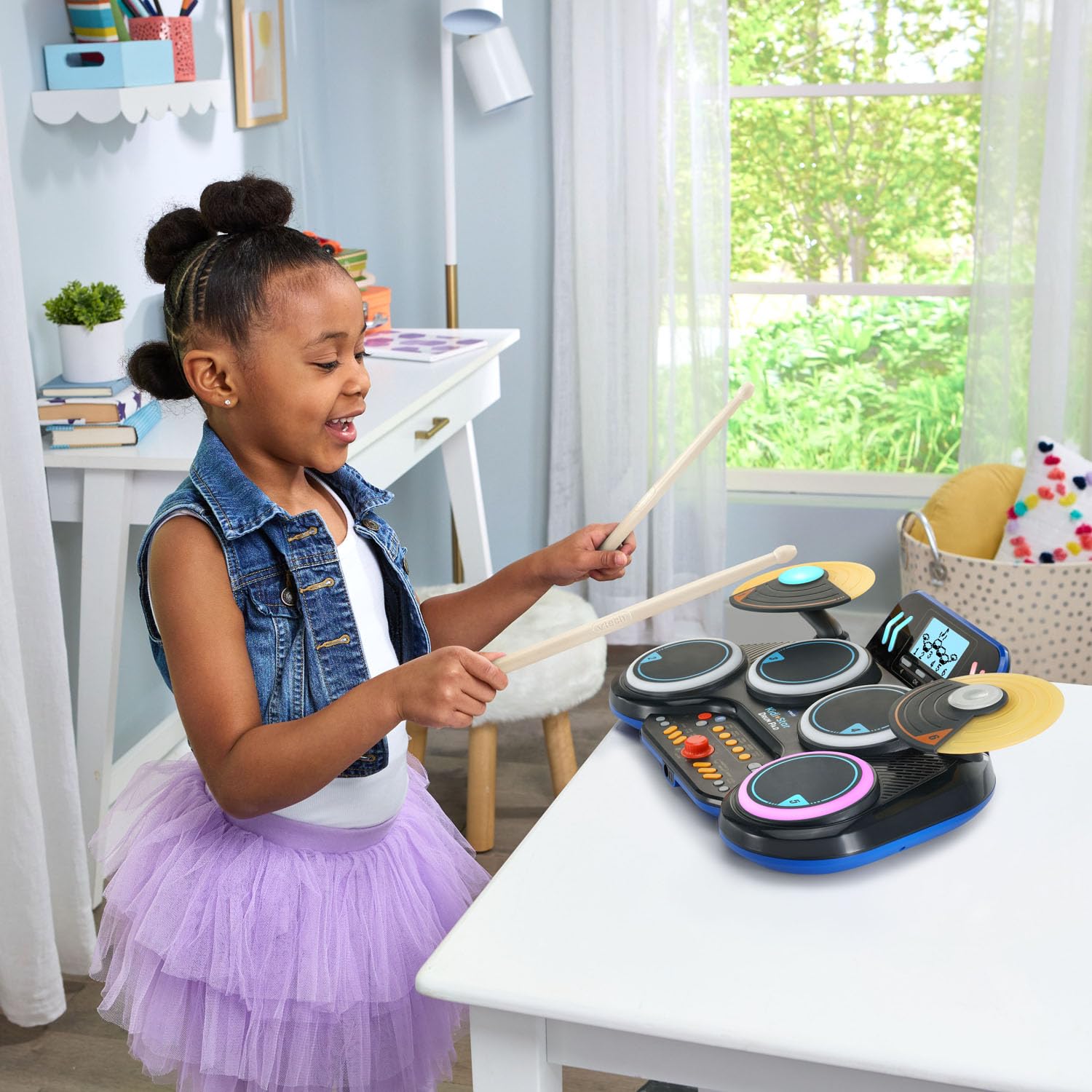 VTech Kidi Star Drum Pad in black, featuring colorful drum pads and control buttons for kids' music play and creativity.