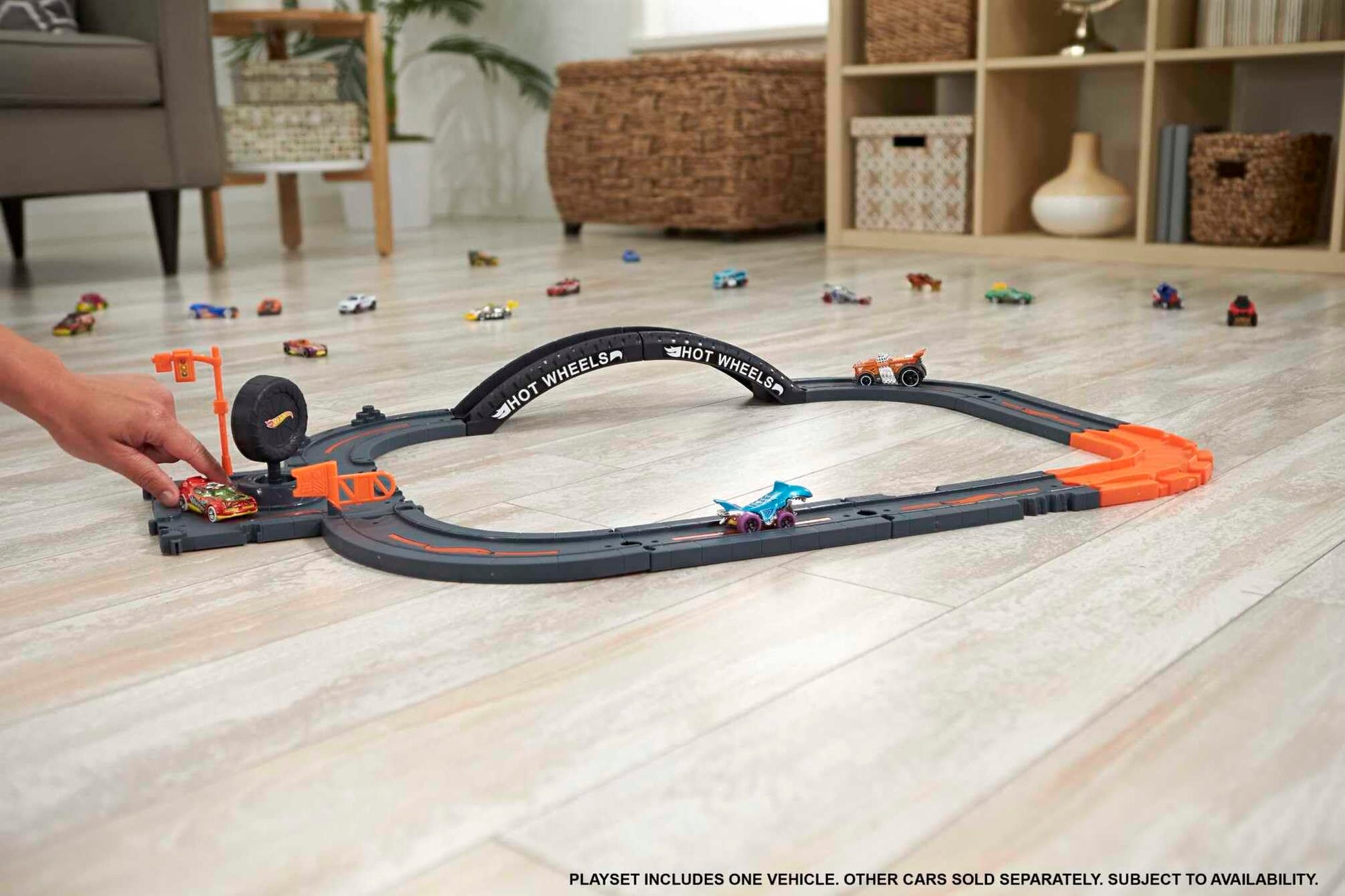 Hot Wheels City Track Pack with 10 pieces, track base, various track pieces, and one car for kids 4 years and up.