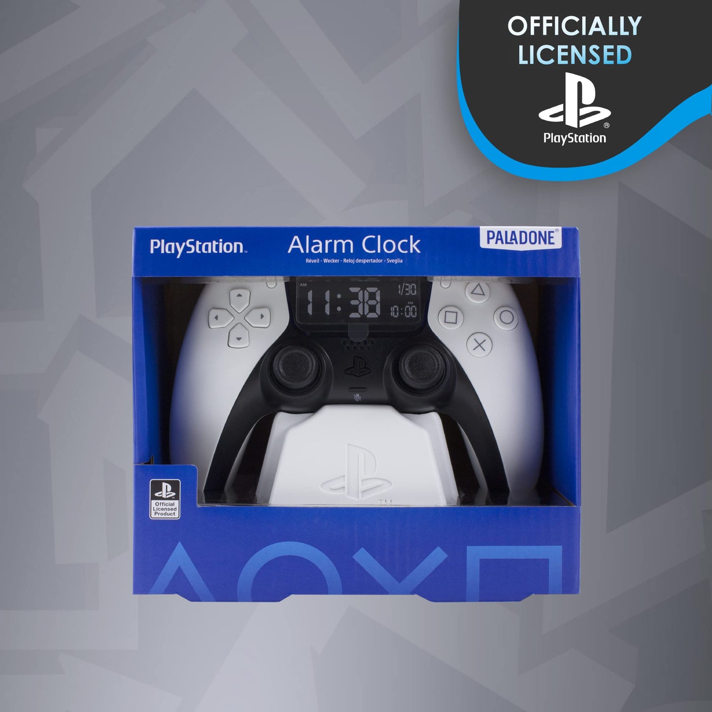 Paladone PlayStation PS5 controller alarm clock in white showing digital time, date, and gaming-themed design for bedroom decor.