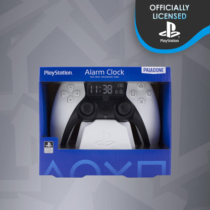 Paladone PlayStation PS5 controller alarm clock in white showing digital time, date, and gaming-themed design for bedroom decor.