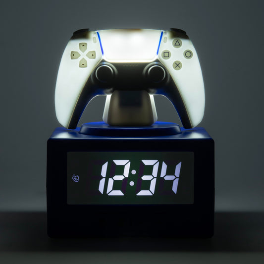 Paladone PlayStation DualSense controller digital alarm clock with night light, sleek gaming-themed bedroom décor for kids and teens.