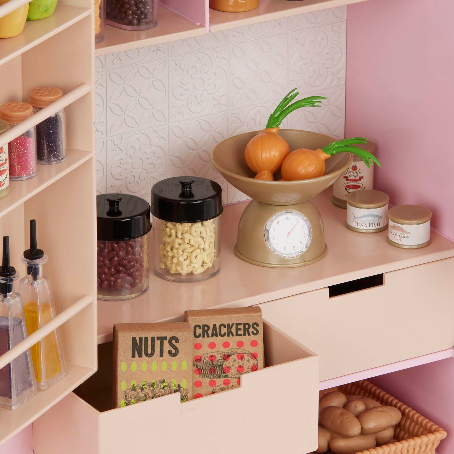 Our Generation Pretty Pantry furniture set with pink cupboard and food accessories for 18-inch dolls, perfect for pretend play.