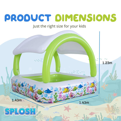 Splosh inflatable square paddling pool with sun shade for kids, measuring 1.43m x 1.43m, set up in a garden.