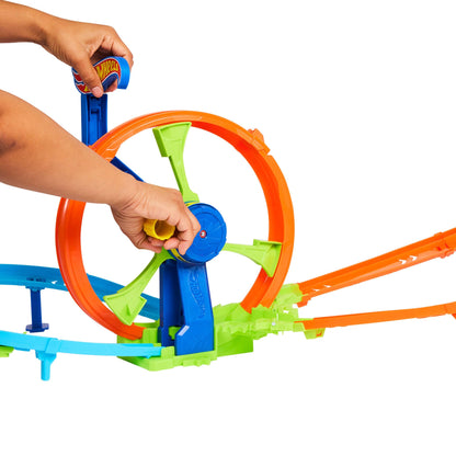 Hot Wheels toy car track set featuring a figure 8 track, loop-kicker booster, and a 1:64 scale die-cast vehicle.