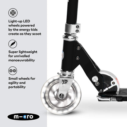 Micro Scooters | Micro Sprite Classic LED Children's Scooter | Handlebar Adjustable | Light Up Wheels | Foldable | Kickstand | 5 to Teen | Boys & Girls | Black
