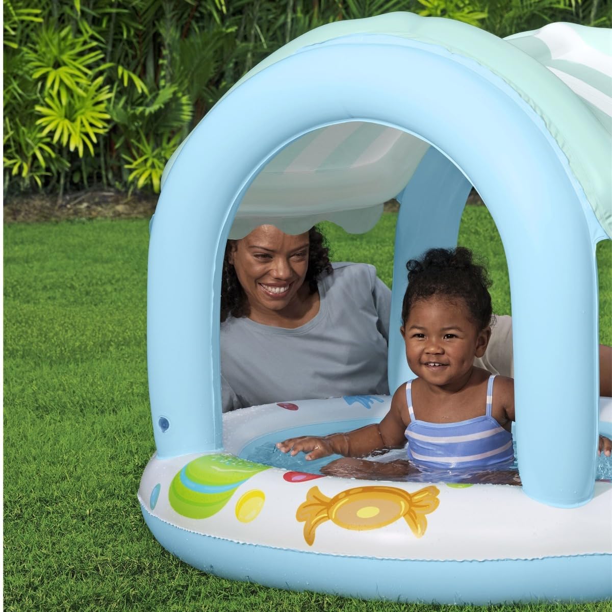 Bestway inflatable sweet shop paddling pool for kids with shade canopy, designed for toddlers aged 2 and up.