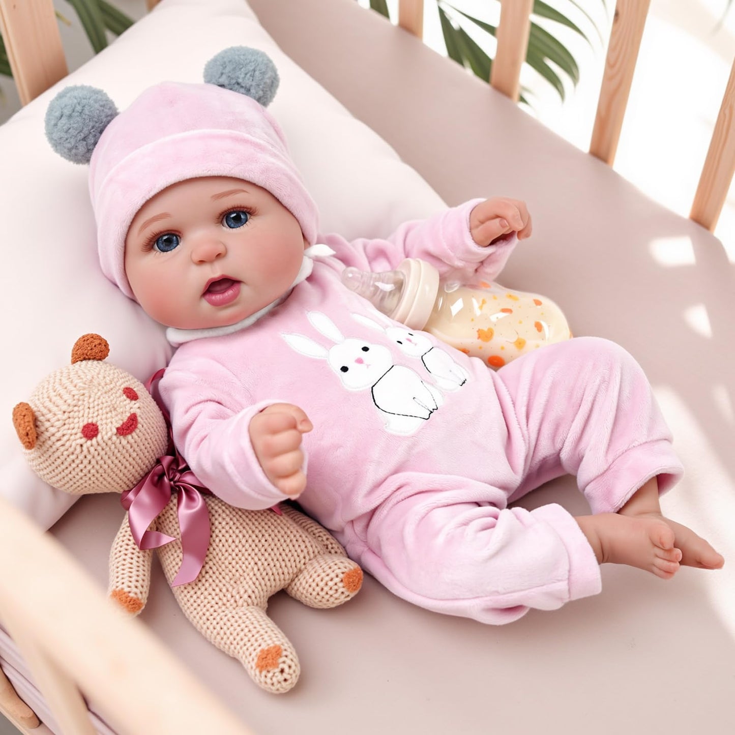 BABESIDE 20-inch lifelike reborn baby doll with soft silicone body, open eyes, dressed in clothes, holding play accessories.
