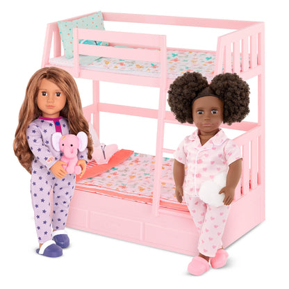 Our Generation Maria fashion doll in pink pyjama onesie holding an elephant plush toy, poseable doll suitable for children 36 months to 12 years