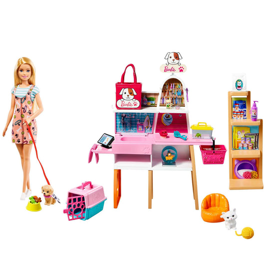 Barbie Doll with blonde hair in a pet boutique playset featuring four pets and color-change grooming accessories.