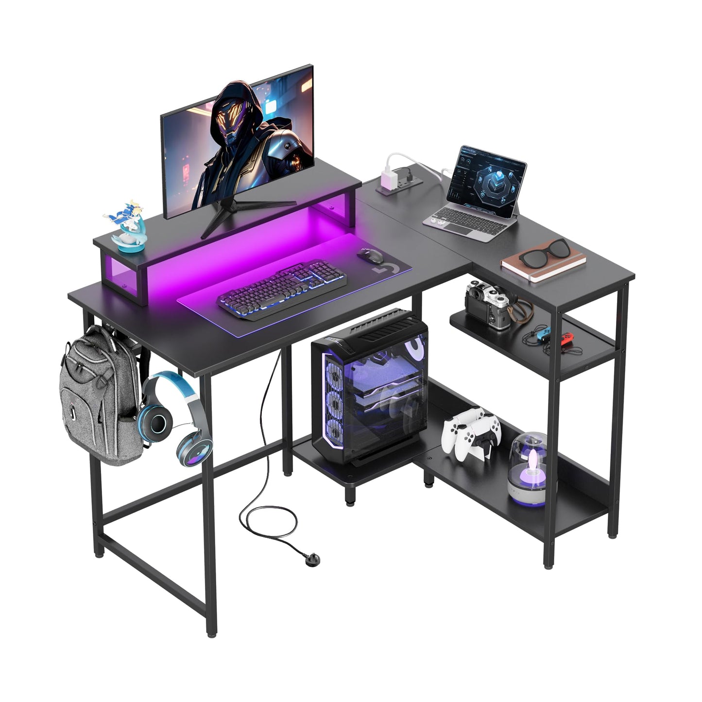 DEVAISE L-shaped gaming desk in black with monitor stand, RGB LED lights, power outlets, hook, and storage shelf for home office.