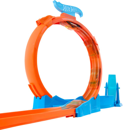 Hot Wheels Triple Loop Track Set with 1:64 scale car and track-building components featuring three loops and speed snap tracks.