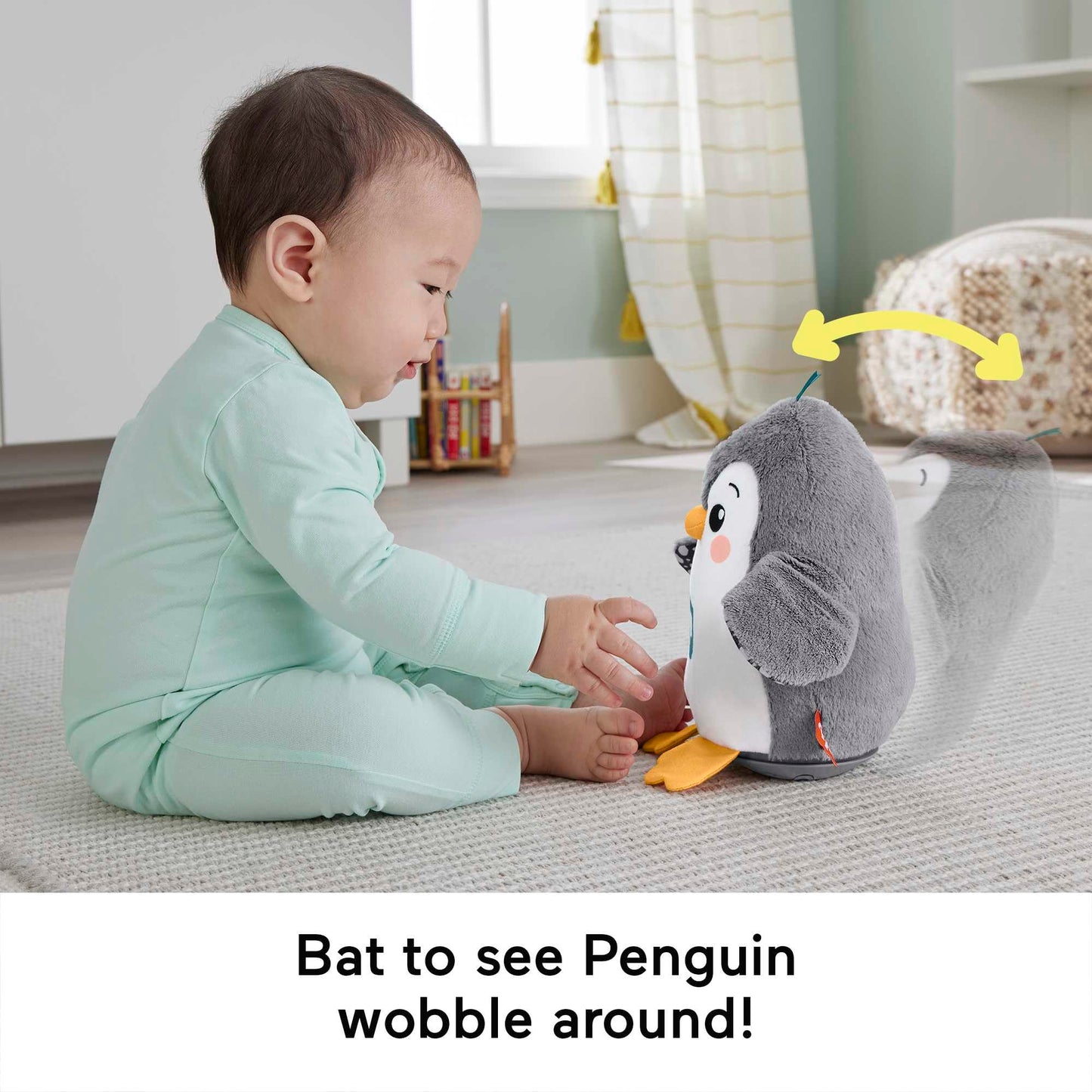 Fisher-Price plush penguin tummy time toy with flaps, wobble motion, and music for sensory play for babies 0+ months.