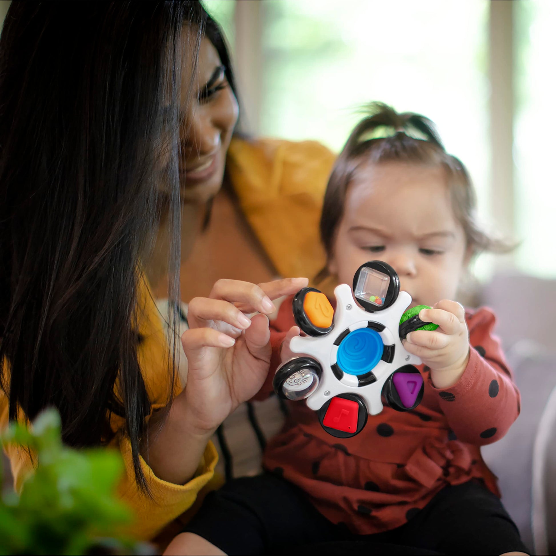 Baby Einstein Curiosity Clutch fidget sensory toy with pop it rattle, BPA-free infant teether for babies 3 months and older.