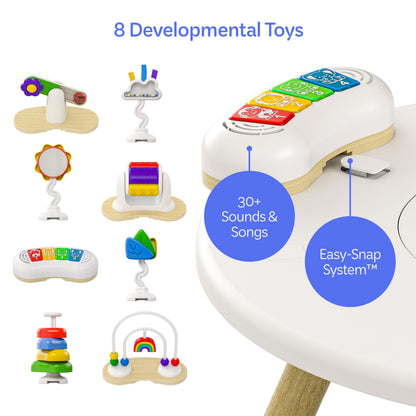 Move2Play 4-in-1 baby activity center with colorful toys, tummy time mat, and jumper for infants 3-6 months. Montessori-inspired design.
