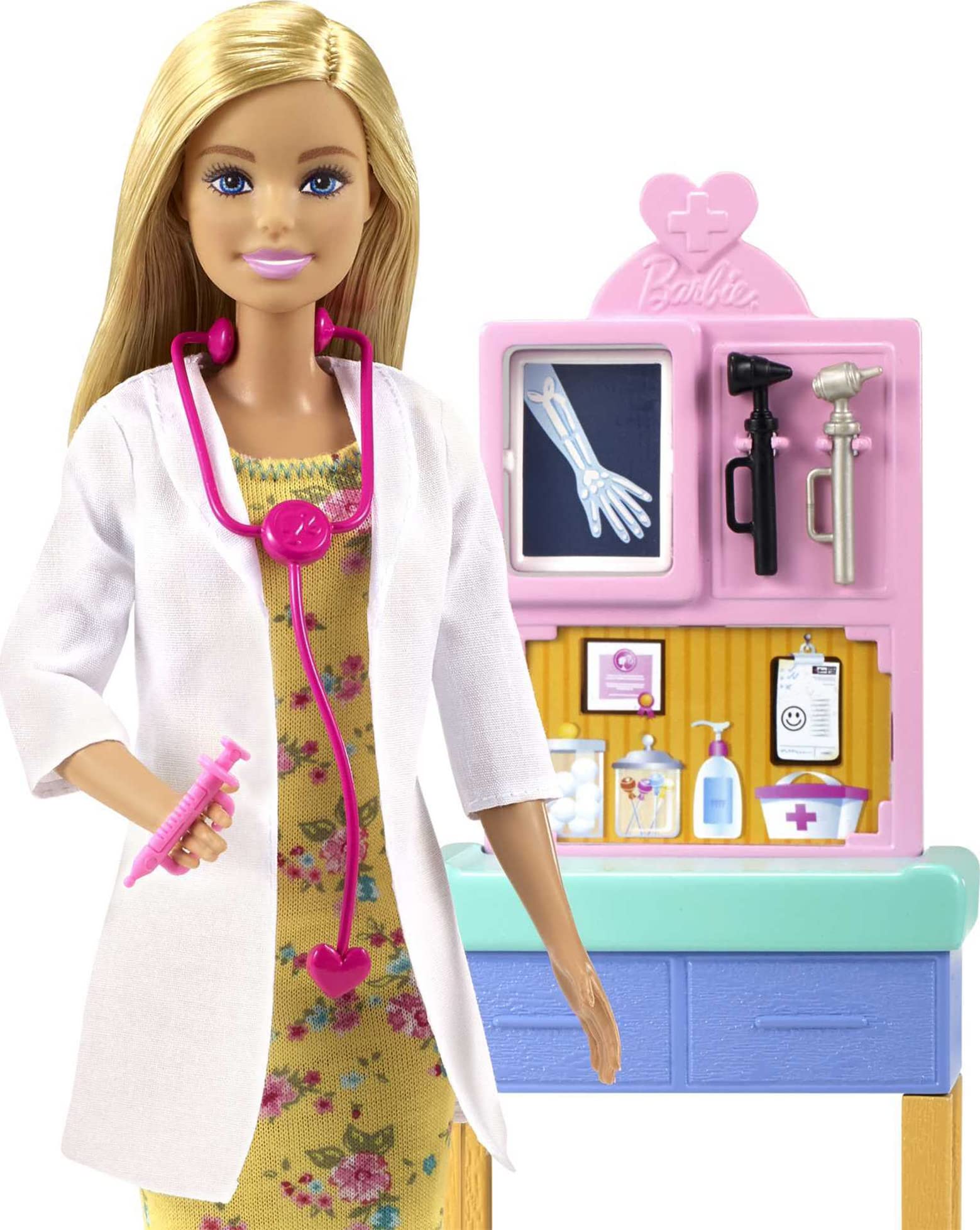 Blonde Barbie Pediatrician Playset with exam table, stethoscope, X-ray, clipboard, patient doll, teddy bear, and medical tools for kids