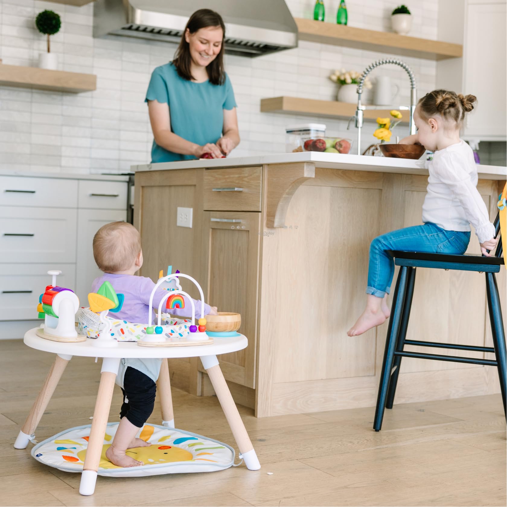Move2Play 4-in-1 baby activity center with colorful toys, sun mat, and tummy time support for infants aged 3-6+ months.
