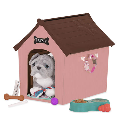 Our Generation OG Puppy House with customizable chalkboard sign and plush pups for 18-inch dolls in a cozy outdoor setting.