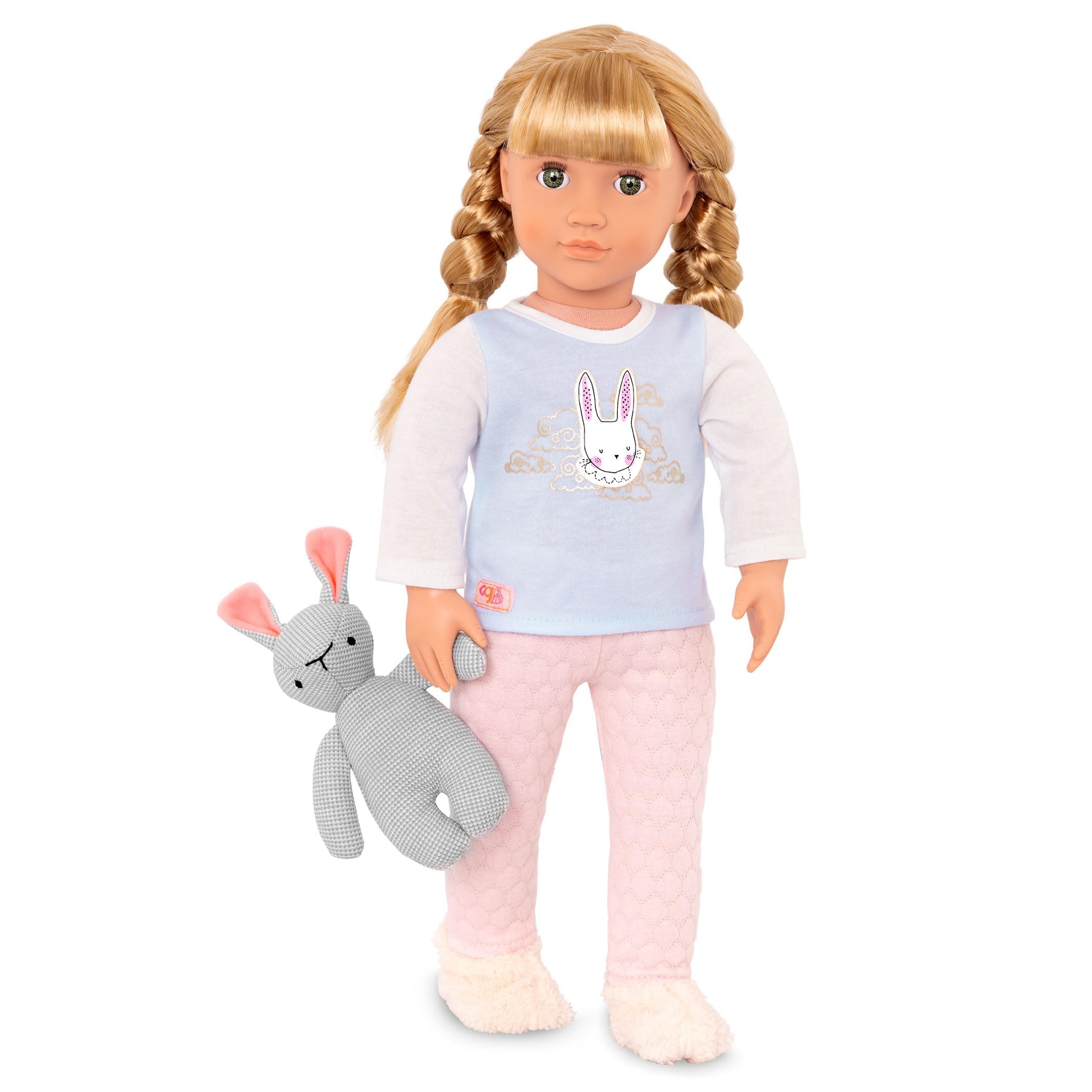 Our Generation 46 cm sleepover doll in pajamas with a soft toy rabbit, perfect for kids ages 3-8.