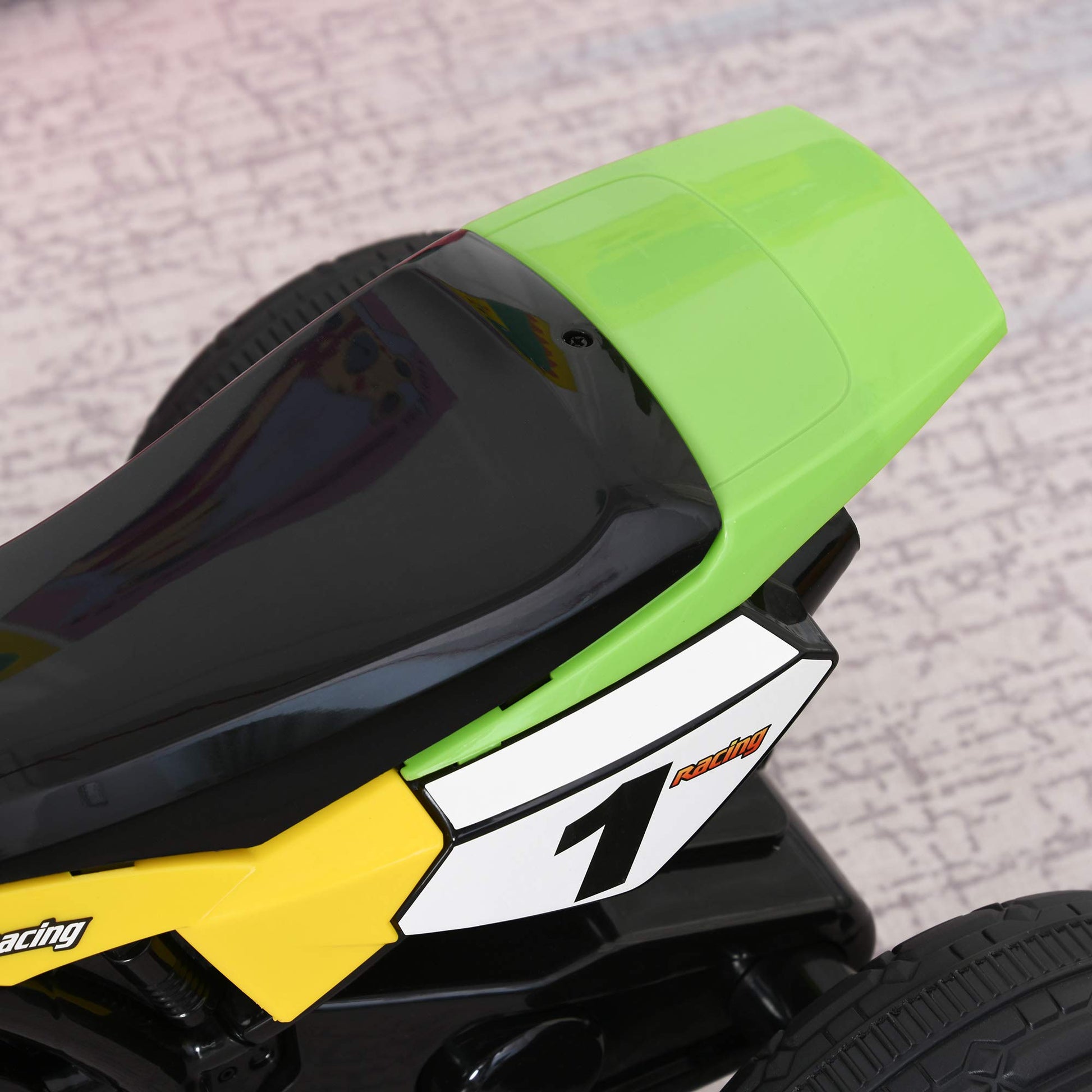 HOMCOM green trike for kids with pedal motorcycle design, music lights, and stickers, ideal for toddlers 18-36 months.