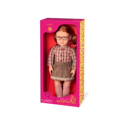 Our Generation April Doll with long red hair, wearing a colorful outfit, ideal for imaginative play and adventures.