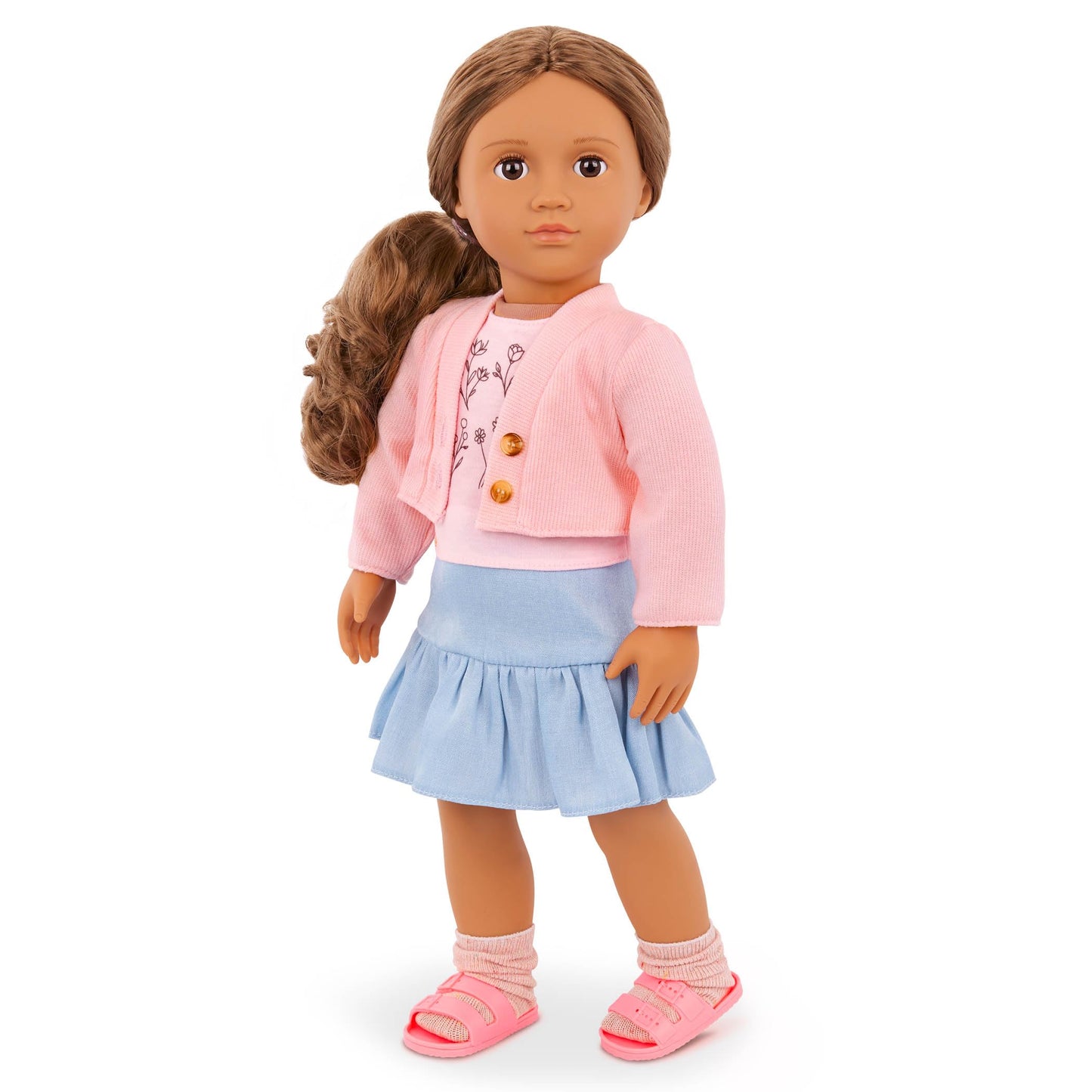 Our Generation 18-inch doll outfit featuring a pink sweater, blue skirt, and floral print top for pretend play.