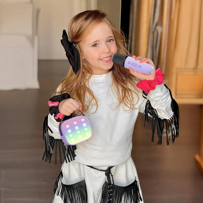 YLL mini karaoke machine in purple with two wireless microphones, ideal for kids' parties and birthday gifts for ages 3 to 12.