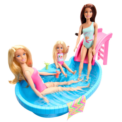 Barbie doll with blonde hair in pink swimsuit by a pool, featuring a slide, towel, and drink accessories.