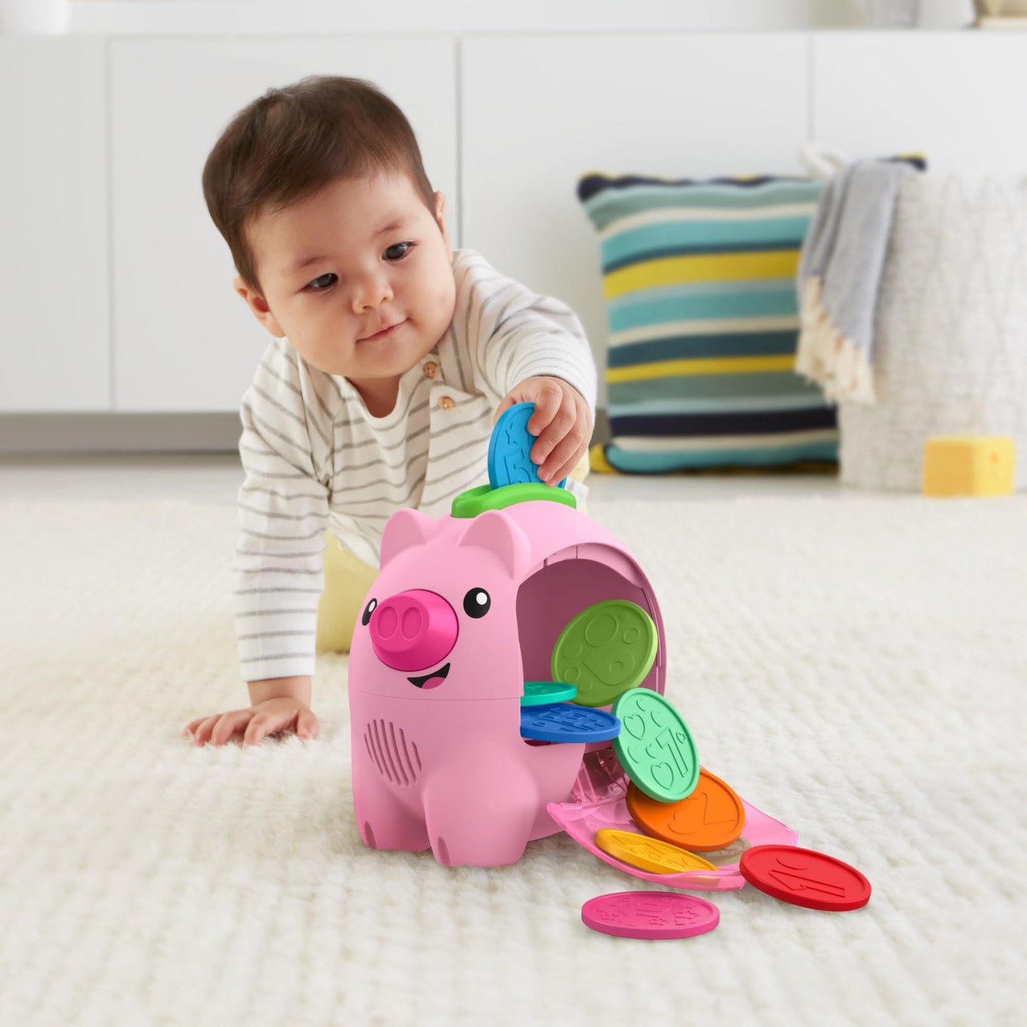 Fisher-Price Laugh & Learn Count & Rumble Piggy Bank musical baby toy with colorful design and engaging motion features.