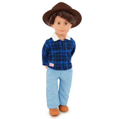 Our Generation Dustin Cowboy Doll with cowboy hat, boots, and lifelike hazel eyes in a western-themed outfit.